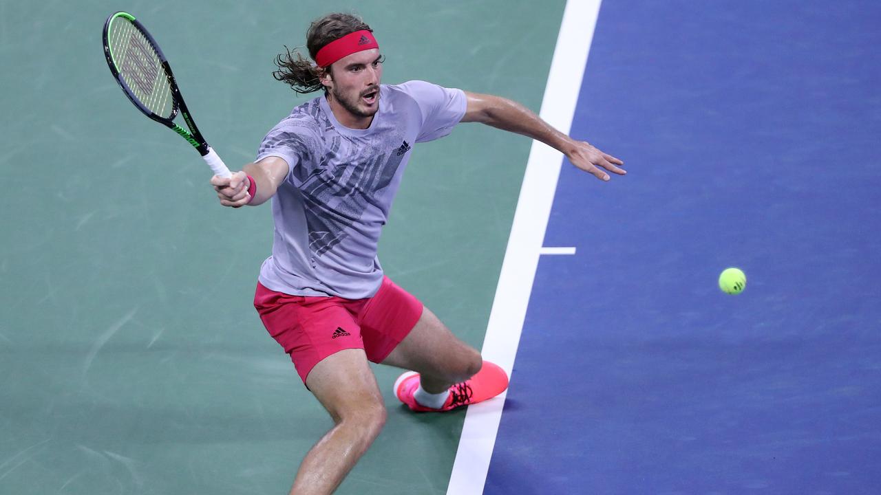 Stefanos Tsitsipas crashed out. (Photo by Matthew Stockman/Getty Images)