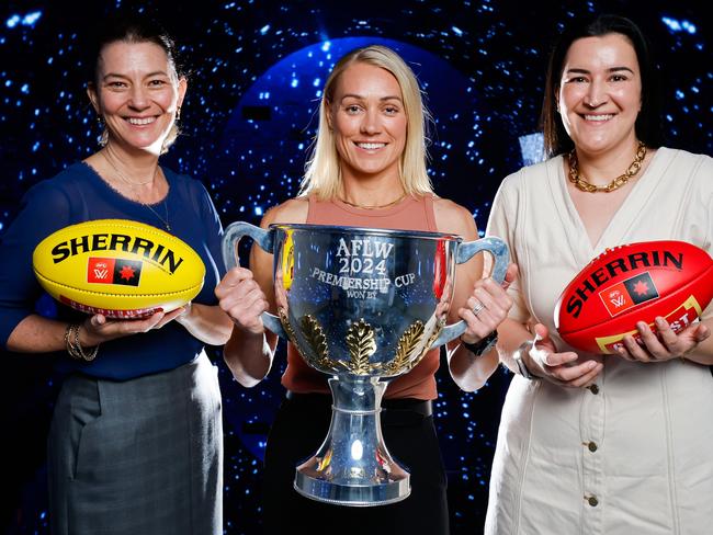 MELBOURNE, AUSTRALIA - NOVEMBER 06: Emma Moore, General Manager of AFLW, Erin Phillips, the 2024 AFLW Premiership Cup Ambassador and Laura Kane, AFL Executive General Manager of Football pose for a photo during the 2024 NAB AFLW Finals Series Launch Media Opportunity at Metart World on November 06, 2024 in Melbourne, Australia. (Photo by Dylan Burns/AFL Photos via Getty Images)