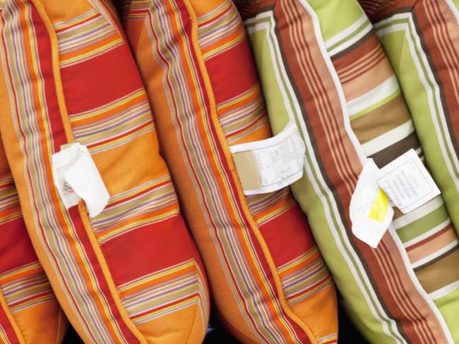 Multicolored cushions on display in store