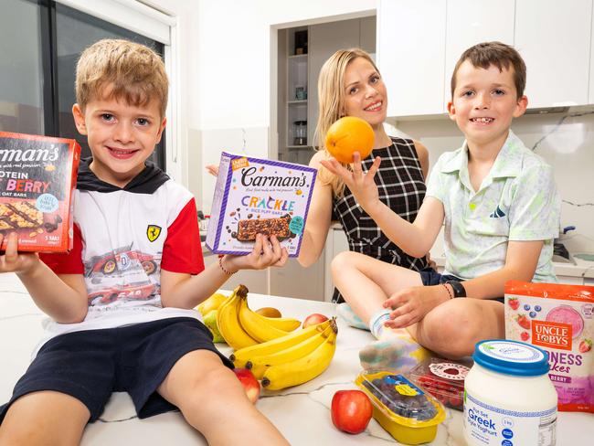 Melbourne mum Anna Plokhikh with her children Jordan (right), 8, and Liam, 6. She says the HSR system can be confusing. Picture: Mark Stewart