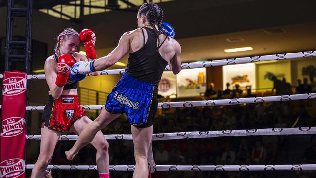 Taleisha Kirk (red) vs Claire Russell (blue) at the NT Fight Series XI at Ventia Stadium. Picture: Pema Tamang Pakhrin