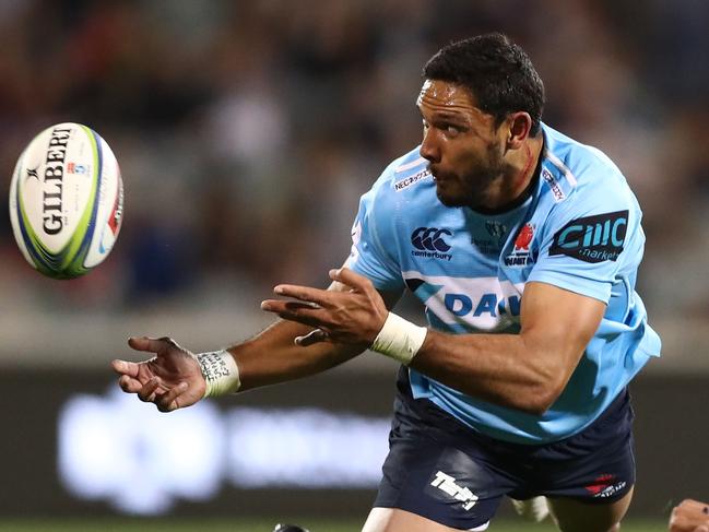 CANBERRA, AUSTRALIA - MARCH 15: Curtis Rona of the Waratahs offloads during the round five Super Rugby match between the Brumbies and the Waratahs at GIO Stadium on March 15, 2019 in Canberra, Australia. (Photo by Mark Metcalfe/Getty Images)