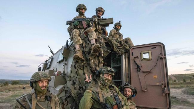 Ukrainian soldiers demonstrate an Australian Bushmaster at a secret training base in the Donetsk region in Ukraine’s east. Picture: Liam Mendes