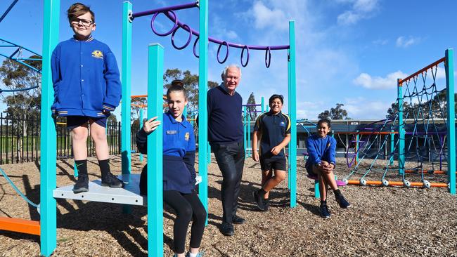 Travis van Ratingen, Alinta Edwards, Jayvan Aialeo and D’jonay Finai with Cranbourne West Primary School principal Andrew Bergmeier. Picture: Aaron Francis.