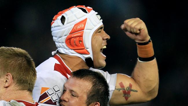 Jamie Soward celebrates a win with the Dragons.