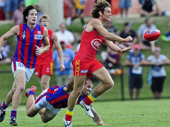 Jack Hutchins playing in the VFL for Gold Coast in 2010.