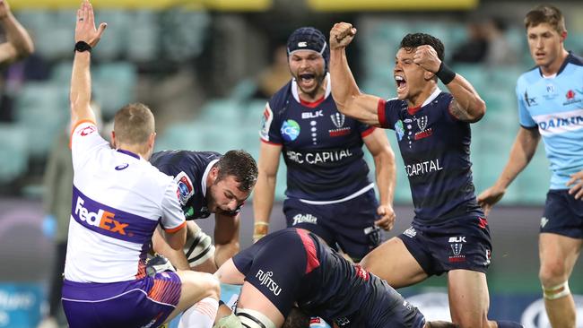 SYDNEY, AUSTRALIA - JULY 24: Matt Toomua of the Rebels celebrates a try by Ryan Louwrens of the Rebels during the round 4 Super Rugby AU match between the NSW Waratahs and the Melbourne Rebels at Sydney Cricket Ground on July 24, 2020 in Sydney, Australia. (Photo by Mark Kolbe/Getty Images)