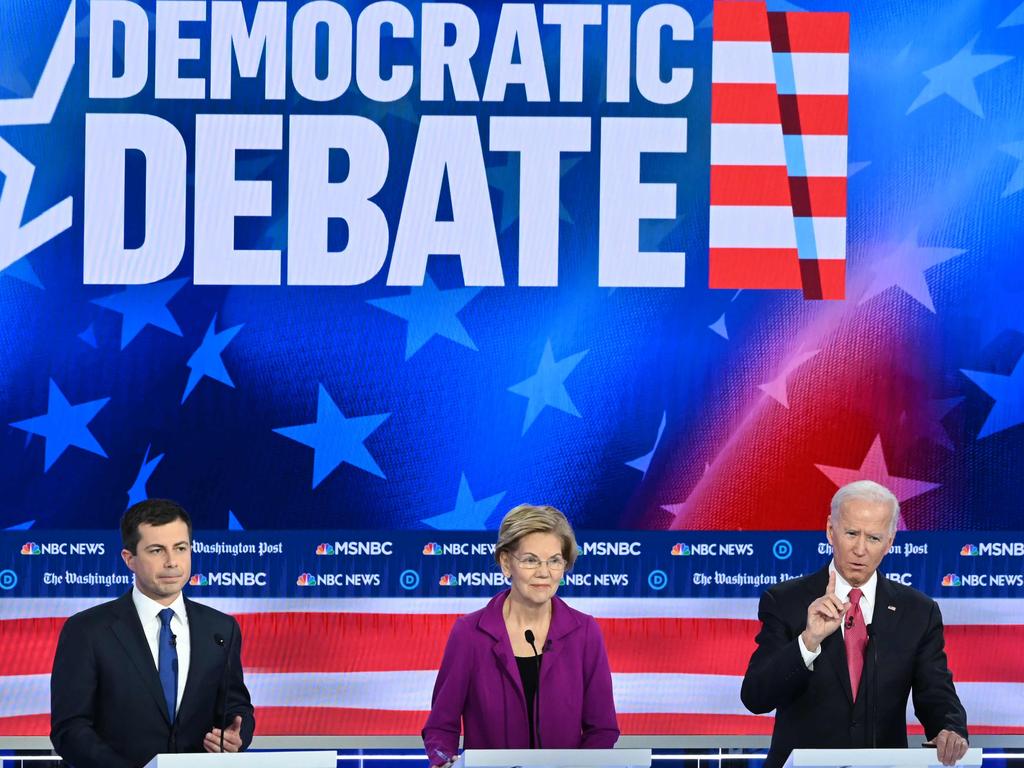 Democratic presidential hopefuls Pete Buttigieg, Elizabeth Warren and Joe Biden participate in the fifth Democratic primary debate of the 2020 presidential campaign. Picture: Saul Loeb / AFP