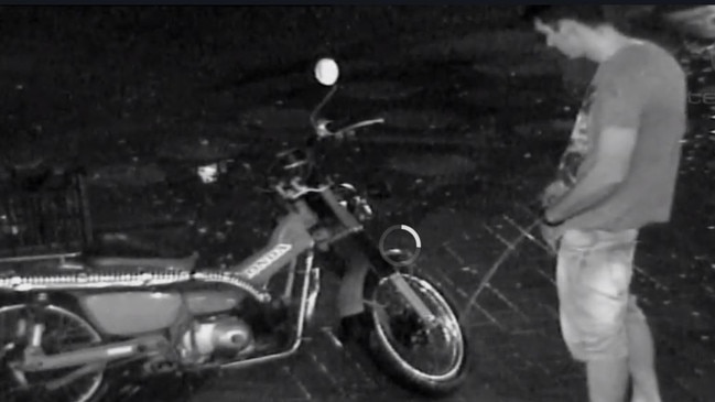 A still from Channel 10's TV series <i>Territory Cops</i> showing CCTV catching a drunk man urinating on a motorcycle in the Smith St Mall in Darwin. Picture: <i>Channel 10</i>