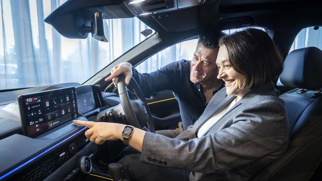 Honda Australia director Carolyn McMahon and Telstra industry executive Jon Young Flores inside the new Honda Accord. Picture: Wayne Taylor.