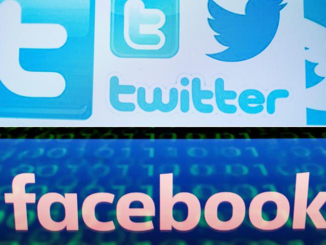 (COMBO) This combination of file pictures created on August 22, 2018 shows a photo illustration taken on March 23, 2018 of Twitter logos on a computer screen in Beijing and a file illustration picture taken on April 28, 2018 of the logo of social network Facebook displayed on a screen and reflected on a tablet in Paris. - A concerted Russian hacking and online disinformation campaign in 2016 sought to tip the US presidential election toward Donald Trump. Two weeks ahead of midterm congressional elections, Moscow's operatives are at it again. The shutdown of thousands of Russian-controlled accounts by Twitter and Facebook -- plus the indictments of 14 people from Russia's notorious troll farm the Internet Research Agency -- have blunted but by no means halted their efforts to influence US politics. (Photos by NICOLAS ASFOURI and Lionel BONAVENTURE / AFP)