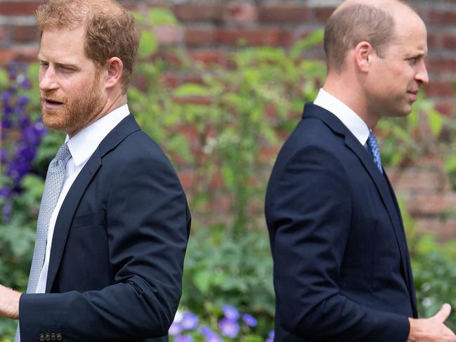 (FILES) In this file photo taken on July 1, 2021 Britain's Prince Harry, Duke of Sussex (L) and Britain's Prince William, Duke of Cambridge attend the unveiling of a statue of their mother, Princess Diana at The Sunken Garden in Kensington Palace, London, which would have been her 60th birthday. - Princes William and Harry will on August 31, 2022 mark the 25th anniversary of the death of their mother Princess Diana, in private but apart as a feud between the brothers shows no sign of ending. The former Lady Diana Spencer, whose fairytale marriage to Prince Charles captivated the world until it publicly unravelled with infidelity and divorce, died in a car crash on August 31, 1997. (Photo by Dominic Lipinski / POOL / AFP)