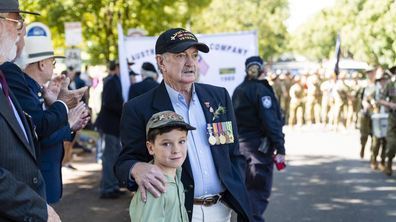 Traves Moloney marched with his granddad Mike Moloney with the Vietnam veterans after the Anzac Day Toowoomba mid-morning Service of Remembrance at the Mothers' Memorial, Tuesday, April 25, 2023. Picture: Kevin Farmer