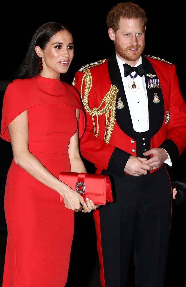 Meghan and Harry at The Mountbatten Festival of Music at one of their final royal appointments in March, where they caught up with Royal Marines. Picture: Simon Dawson/AFP