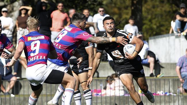 Redfern's Bailey Scholes with the ball. Picture: John Appleyard