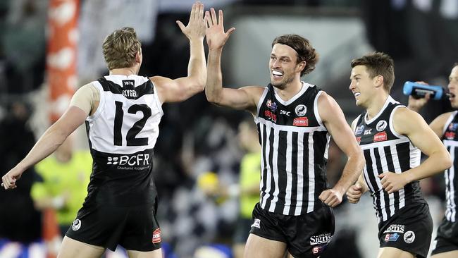 Port Adelaide’s Jarrod Lienert celebrates with Trent McKenzie. Picture: Sarah Reed