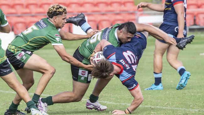 Bud Smith for Clydesdales is tackled by Azariah Puleaga earlier in the season. Picture: Nev Madsen.