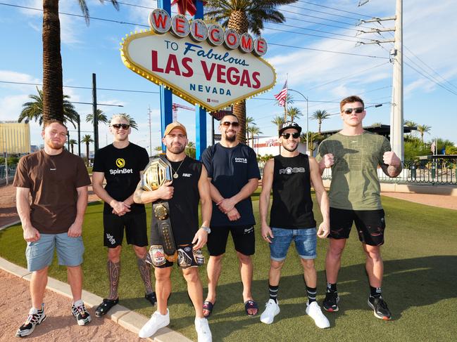 Jack Della Maddalena, Dan Hooker, Alexander Volkanovski, Robert Whittaker, Shannon Ross and Jimmy Crute pose in front of the Welcome to Fabulous Las Vegas sign during UFC International Fight Week. Picture: Chris Unger/Zuffa LLC