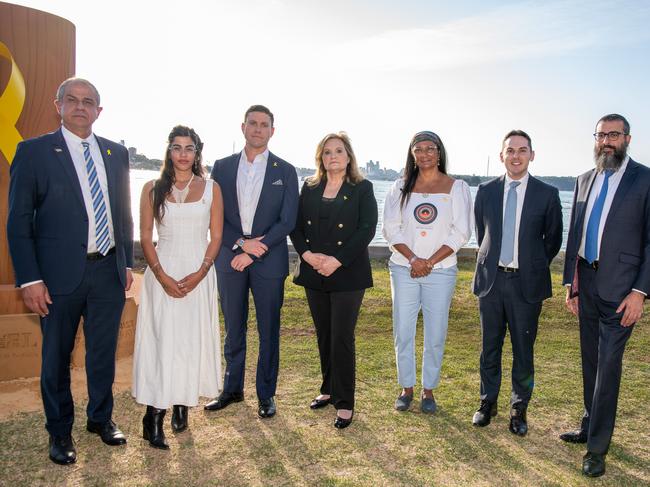 Israel’s Ambassador to Australia Amir Maimon (left) joined other Jewish and Israeli leaders, as well as survivors and relatives of hostages, at a dusk vigil in Rose Bay on Sunday. Picture: Thomas Lisson