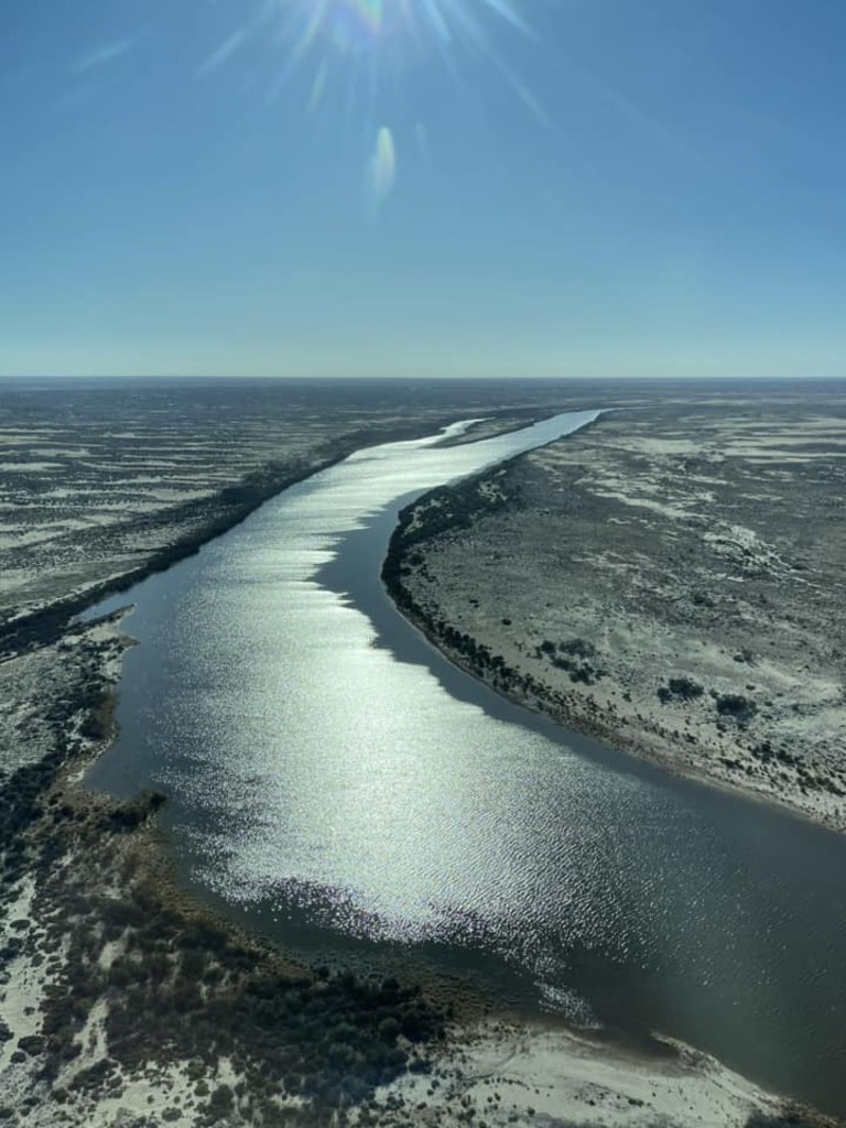 Flood waters travel through Channel Country in the far northeast of South Australia heading towards Lake Eyre. Picture: Wrights Air