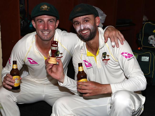 SYDNEY, AUSTRALIA - JANUARY 08:  Shaun Marsh and Nathan Lyon of Australia celebrate with the Ashes Urn in the change rooms during day five of the Fifth Test match in the 2017/18 Ashes Series between Australia and England at Sydney Cricket Ground on January 8, 2018 in Sydney, Australia.  (Photo by Ryan Pierse/Getty Images)