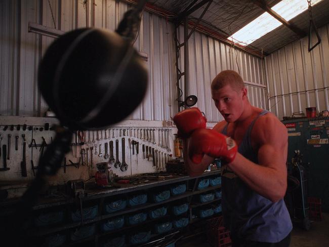 Barry Hall, 20, who was the Victorian bantamweight boxing champion but now plays football for St Kilda. p/. a/ct. 14 March 1997./boxing         /football