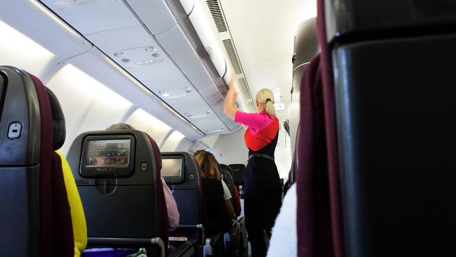 The Flight Attendants Association of Australia says moving luggage around overhead lockers is the most common cause of injury to cabin crew. Picture: iStock