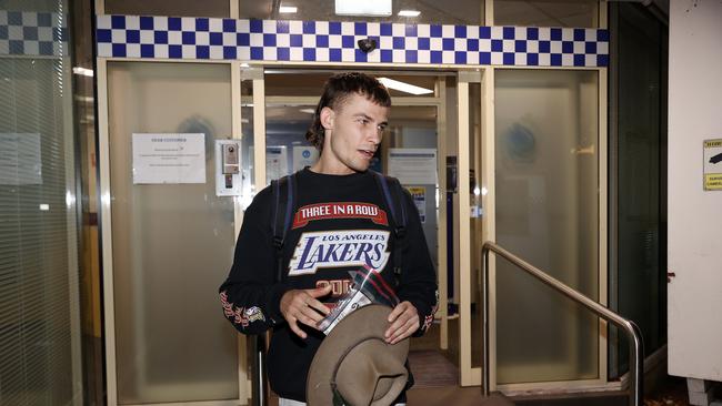 Star boxer-turned-reality star Harry Garside leaving Mascot Police Station. Picture: Jonathan Ng.