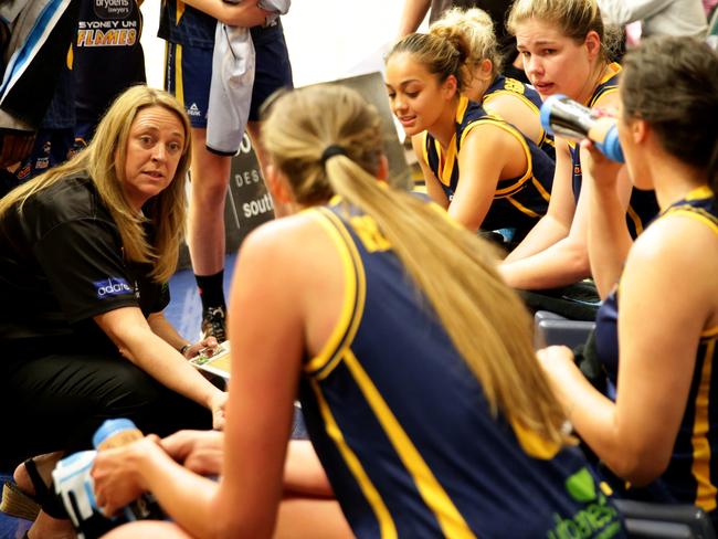 Head coach Cheryl Chambers talks to her team during the last WNBL season.