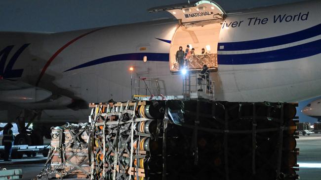 Weapons sent to Ukraine by the United States are unloaded at Kyiv airport. Picture: AFP