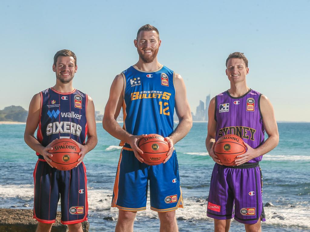 Adelaide 36ers player Jason Cadee, Brisbane Bullets player Aron Baynes and Sydney Kings’ Shaun Bruce at Burleigh Heads. Picture:Glenn Campbell