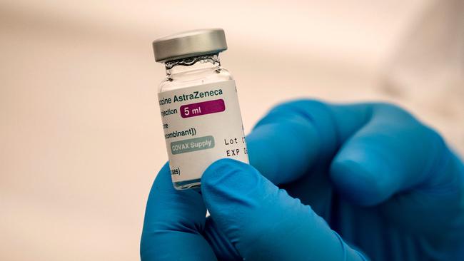 A health worker shows a vial of the AstraZeneca vaccine. Picture: Fadel Senna/AFP