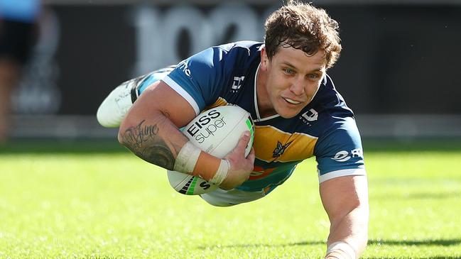 Jarrod Wallace goes over for the Titans at Cbus Super Stadium. Picture: Getty Images