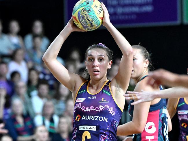 BRISBANE, AUSTRALIA - JUNE 04: Leesa Mi Mi of the Firebirds looks to pass during the round 12 Super Netball match between Queensland Firebirds and Melbourne Vixens at Nissan Arena, on June 04, 2023, in Brisbane, Australia. (Photo by Bradley Kanaris/Getty Images)