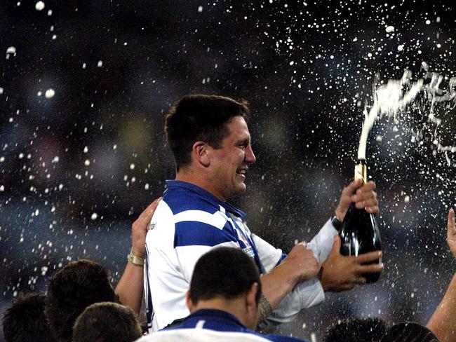 Steve Price celebrates the Bulldogs Grand Final win over the Roosters in 2004. Picture: Craig Wilson