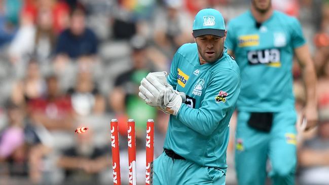 Ab de Villiers of the Heat hits the stumps during the Big Bash League match between the Melbourne Renegades and the Brisbane Heat at Marvel Stadium.