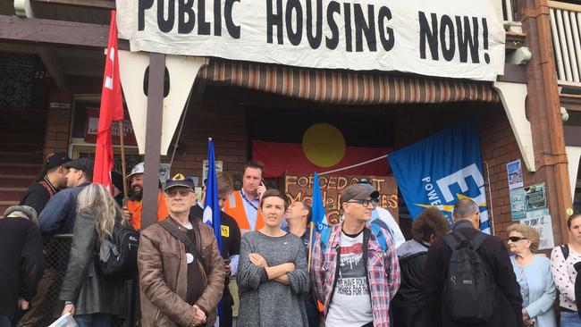 Protesters gather outside a home in the Sydney suburb of Millers Point on Tuesday, May 9, 2017. Led by unions, the group stood on the veranda and blocked the door to Peter Muller's home in anticipation of the sheriff's arrival to evict the 57-year-old who has lived in the area for 20 years.