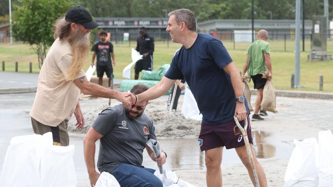 Treasurer Jim Chalmers fills sandbags ahead of Cyclone Alfred this month. Picture: Annette Dew