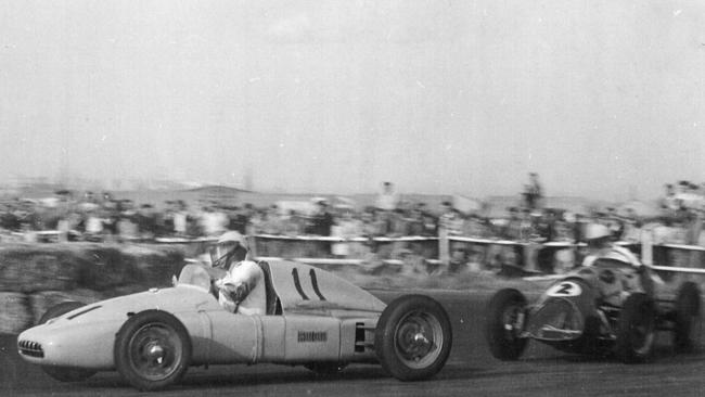 Arthur Wylie in his Wylie Javelin (number 11) followed by Jack Brabham in his Cooper Bristol (number 2) competing in the Victoria Trophy at Fisherman's Bend on March 22, 1954.