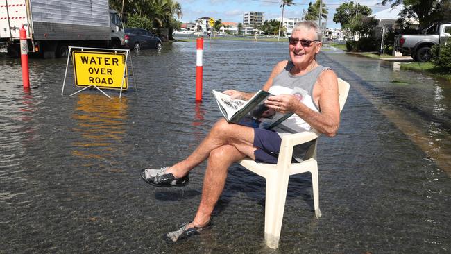 Flooding from the King tide at Budds Beach at Surfers Paradise was made worse by the approaching storm system. Local Bryan King enjoys his new waterfront vista in Palm Ave. (contact no 0402 033355).  Picture Glenn Hampson