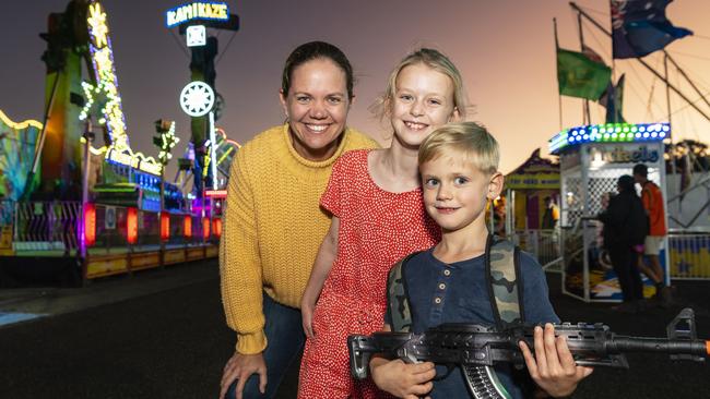 Belinda Bill with daughter Matilda Bill and son Lawson Bill enjoying sideshow alley at the Toowoomba Royal Show, Thursday, March 30, 2023. Picture: Kevin Farmer