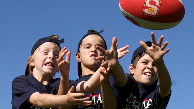 Flashback ... James Rowe (son of Stephen), Jackson Edwards (son of Tyson) and Ben Jarman (son of Darren) in action in 2008 at the Jarman Football Super Clinic at Immanuel College. Ben is a Crow, while James and Jackson are poised to hjoin him.