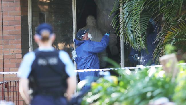 The crime scene in Hamilton South, Newcastle, where a man was shot dead at the front door of his apartment block on Tuesday night. Picture by Peter Lorimer.