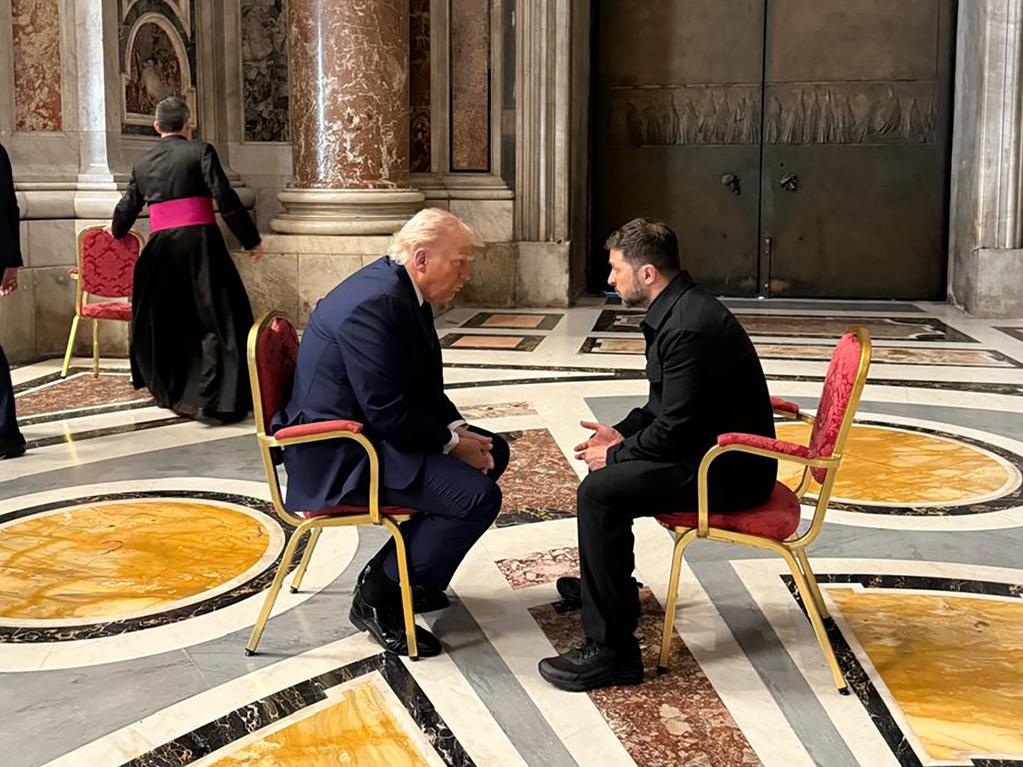 Volodymyr Zelensky and Donald Trump talk as they attend the funeral of Pope Francis. Picture: AP