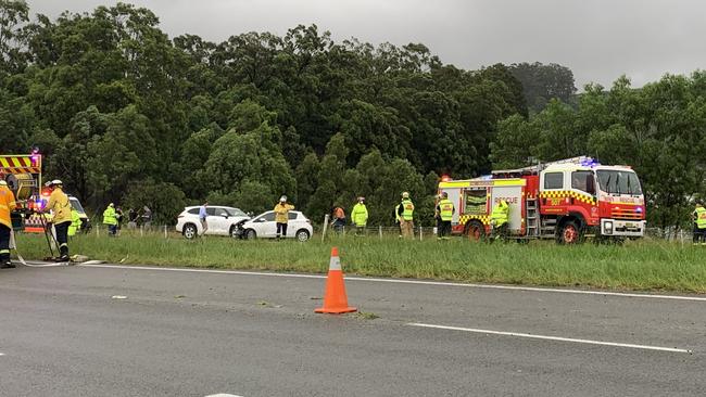 Emergency services attend a three-car crash in the northbound lanes of the Pacific Highway about 2km north of the Woolgoolga turn off on Thursday. Picture: Sandra Moon