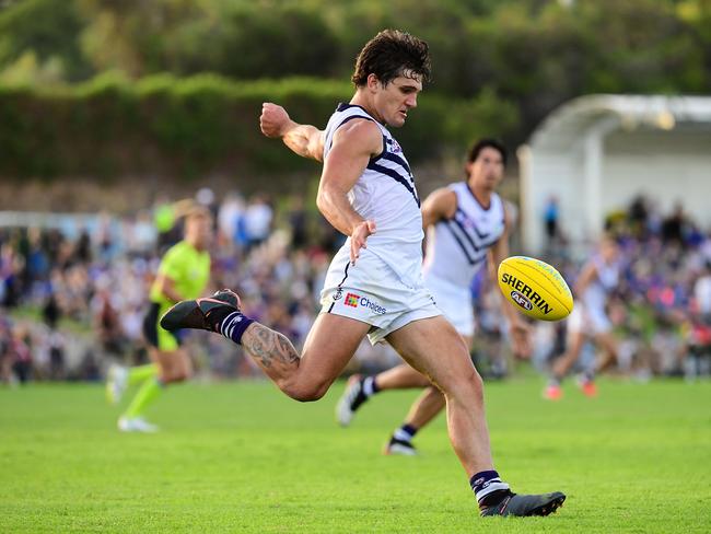 JOONDALUP, AUSTRALIA - MARCH 07: Lachie Schultz of the Dockers kicks the ball during the 2020 Marsh Community Series match between the West Coast Eagles and the Fremantle Dockers at HBF Arena on March 07, 2020 in Joondalup, Australia. (Photo by Daniel Carson/AFL Photos via Getty Images)