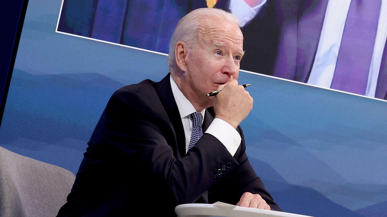 The President then returned his hand to his chin, with the RNC claiming he put something in his mouth. Picture: Anna Moneymaker/Getty Images/AFP