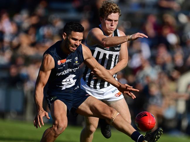 South Adelaide’s Matthew Rankine and Port Adelaide’s Jack Strange compete for the ball. Picture: Tom Huntley