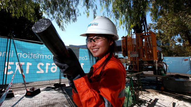 Sydney Metro West Geotechnical engineer Stephanie Liew pictured with soil samples at a drilling site in Sydney Olympic Park. Picture: Toby Zerna