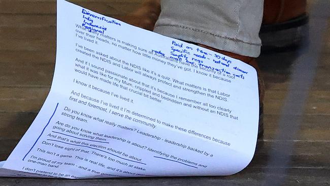 Labor leader Anthony Albanese's notes fly off the lectern during a press conference at Addison Road Community Centre, Marrickville, seat of Grayndler. Picture: Liam Kidston